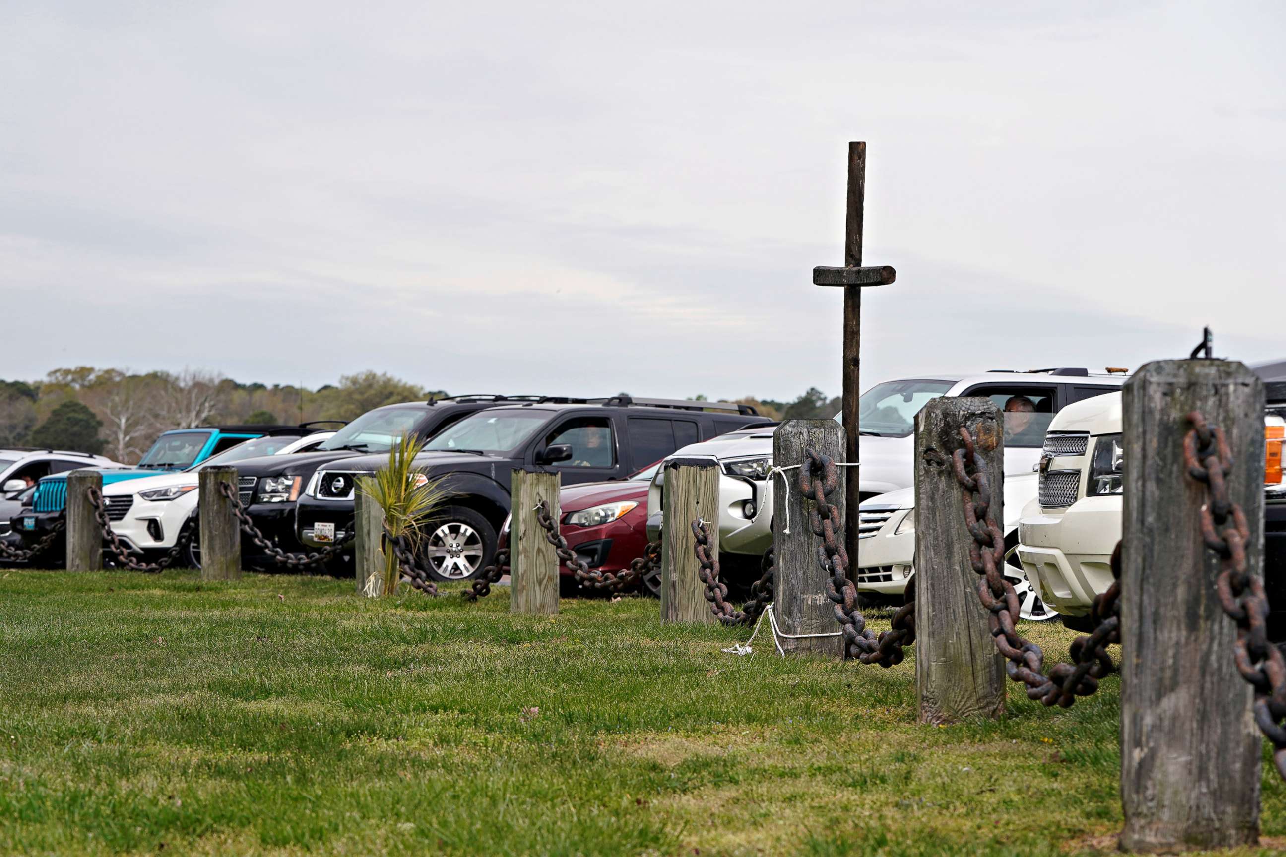PHOTO: Congregants pray in their vehicles as they attend Easter Sunday drive-in church services as part of social distancing practices during the outbreak of coronavirus disease (COVID-19) in Cambridge, Maryland, April 12, 2020.