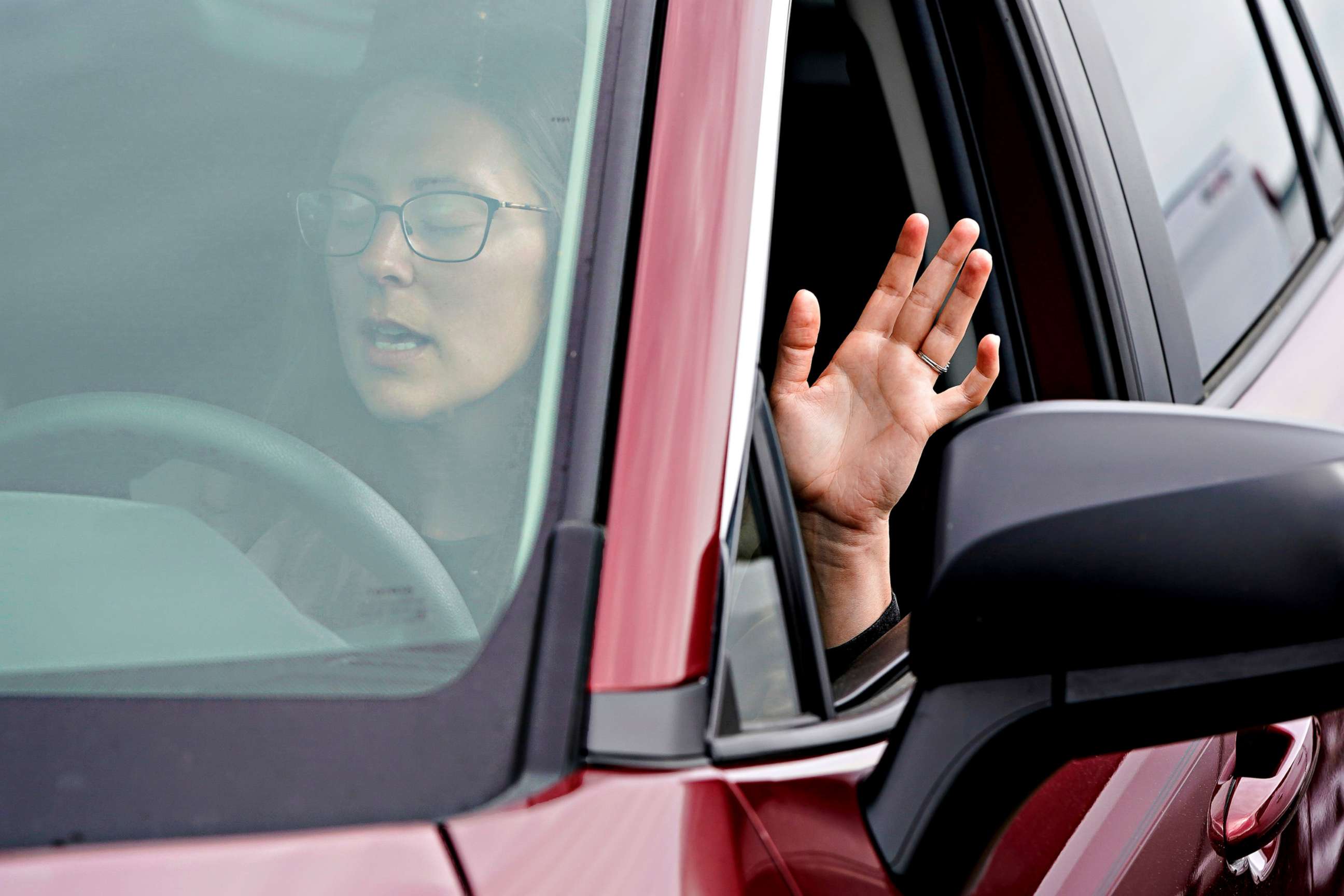 PHOTO: A congregant prays in her vehicle as she attends Easter Sunday drive-in church services as part of social distancing practices during the outbreak of coronavirus disease (COVID-19) in Cambridge, Maryland, April 12, 2020. 