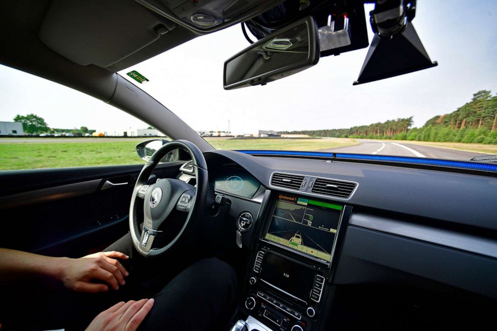PHOTO: A person seats behind the wheel of a hands free self-driving system designed for motorways during a media event to showcase new automotive technologies on June 20, 2017 in Hannover, Germany. 
