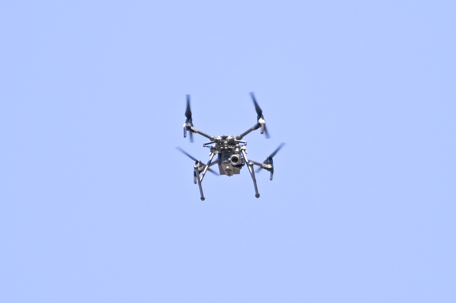 PHOTO:A drone with a camera attached, flies over a vigil remembering the death of George Floyd, June 4, 2020, in Riverside, Calif. 