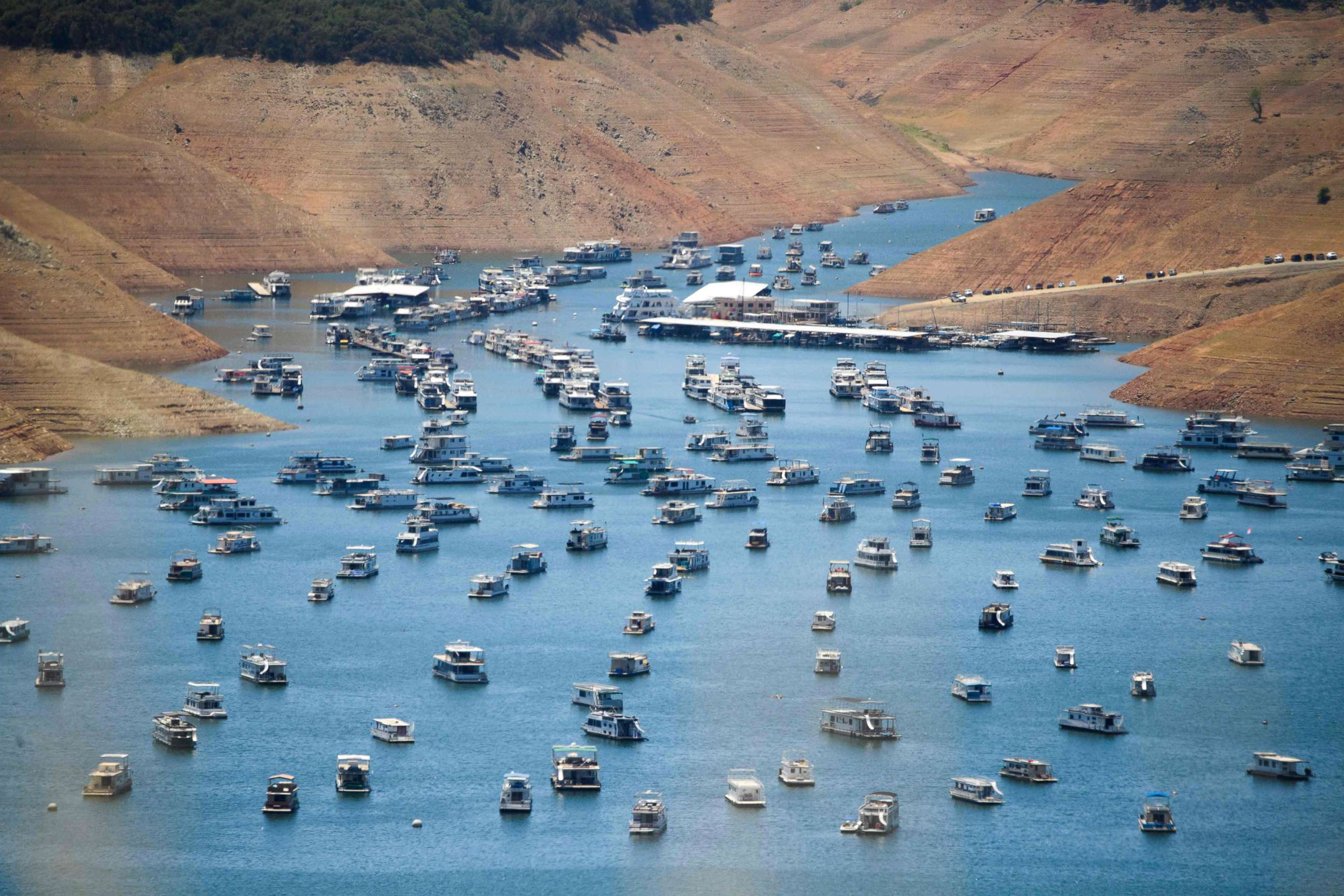 PHOTO: Houseboats are moored on Lake Oroville reservoir during the California drought emergency, May 25, 2021, in Oroville, Calif. 