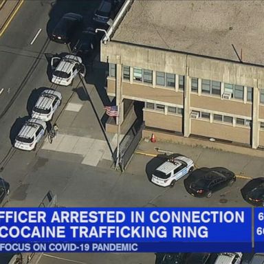 The officer allegedly served as a lookout for cocaine traffickers.