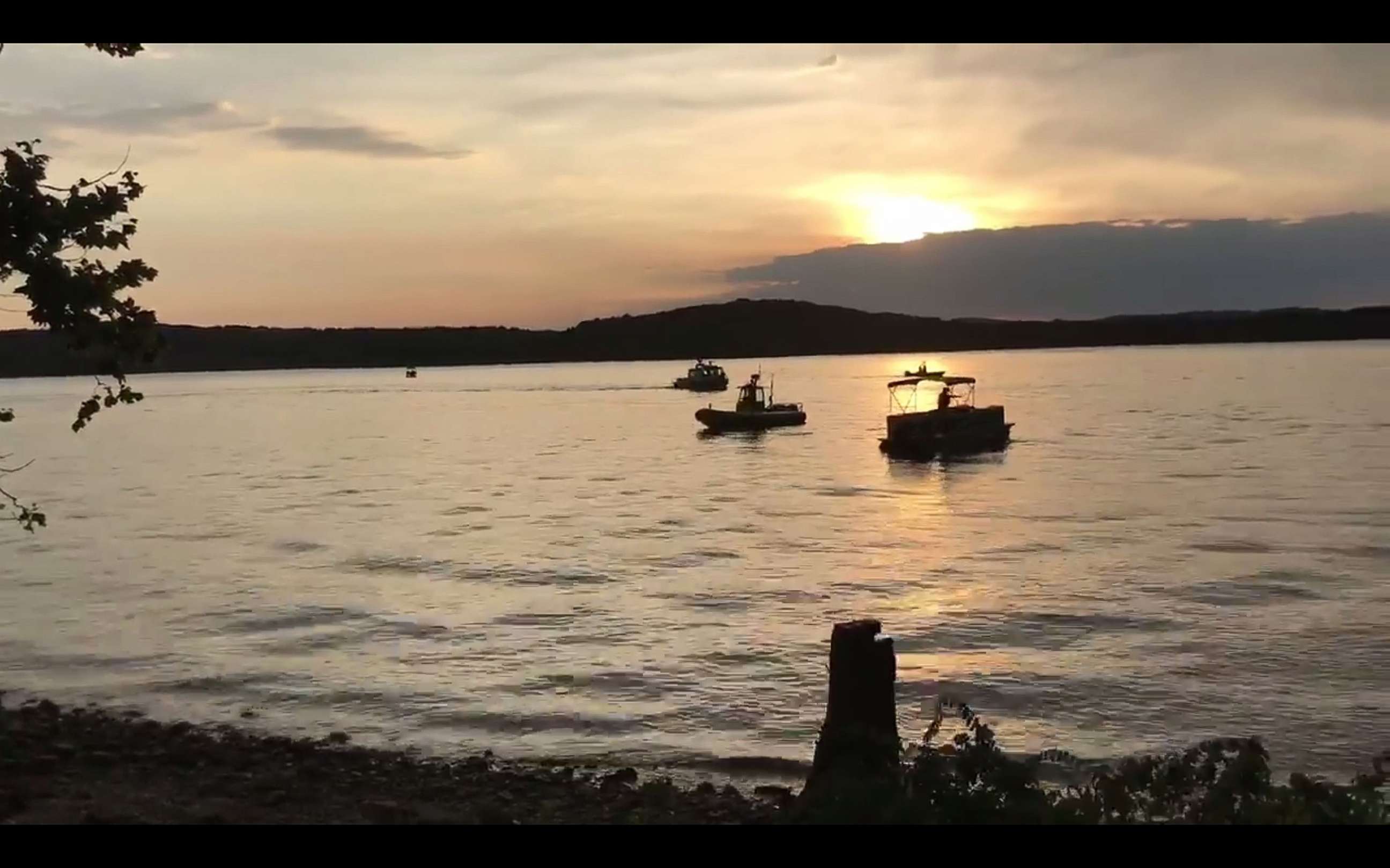 PHOTO: A handout frame grab made available by the Southern Stone County Fire Protection District shows responding agencies after an amphibious duck boat reportedly capsized on Table Rock Lake in Branson, Mo., July 19, 2018. 