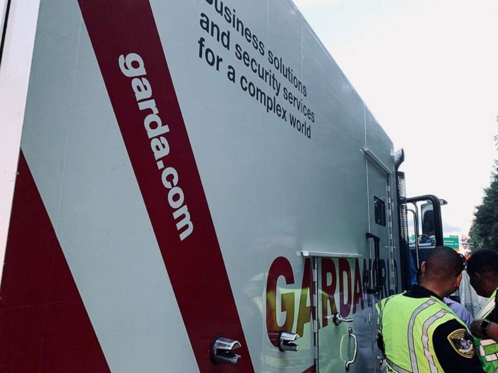 PHOTO: An armored truck spilled $175,000 onto Interstate 285 in Dunwoody, Ga., on Tuesday, July 9, 2019.