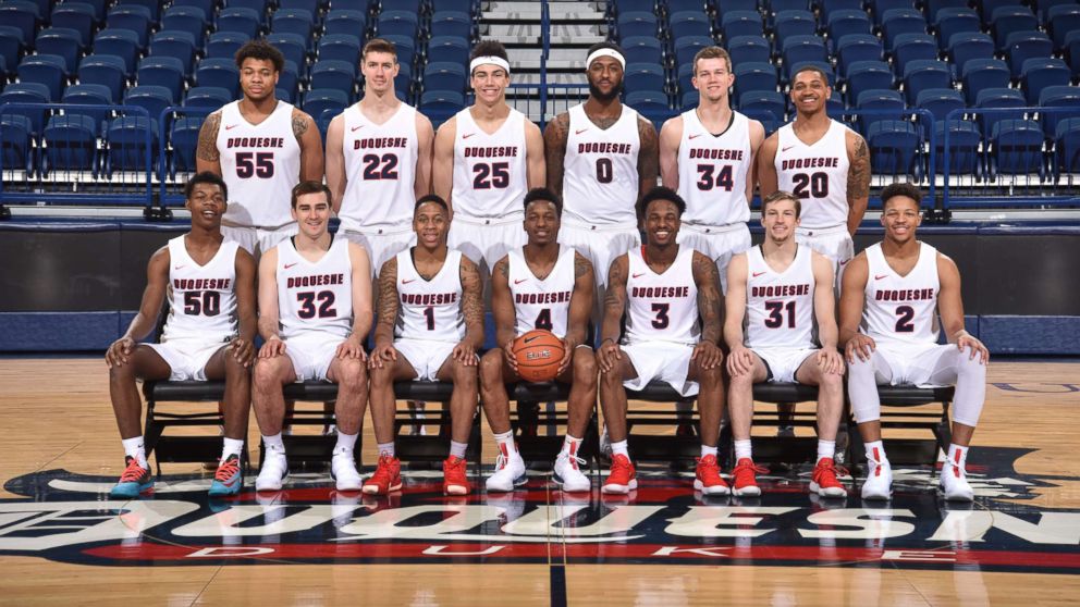 PHOTO: Duquesne University basketball player Mike Lewis II, seen in this team photo, was hailed for helping a homeless woman. 