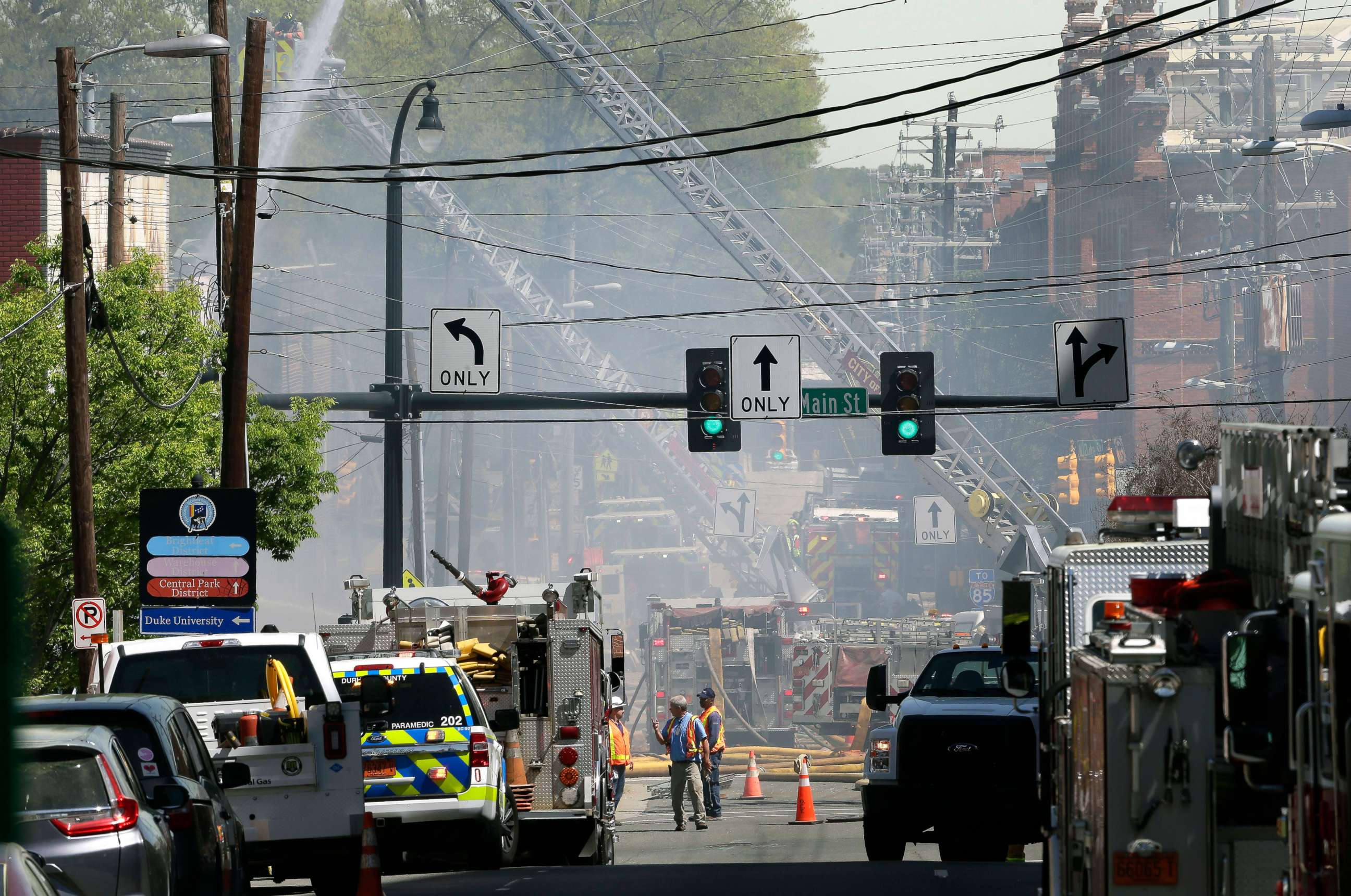PHOTO: Firefighters and emergency personnel work the scene of an explosion and building fire in downtown Durham, N.C., April 10, 2019.