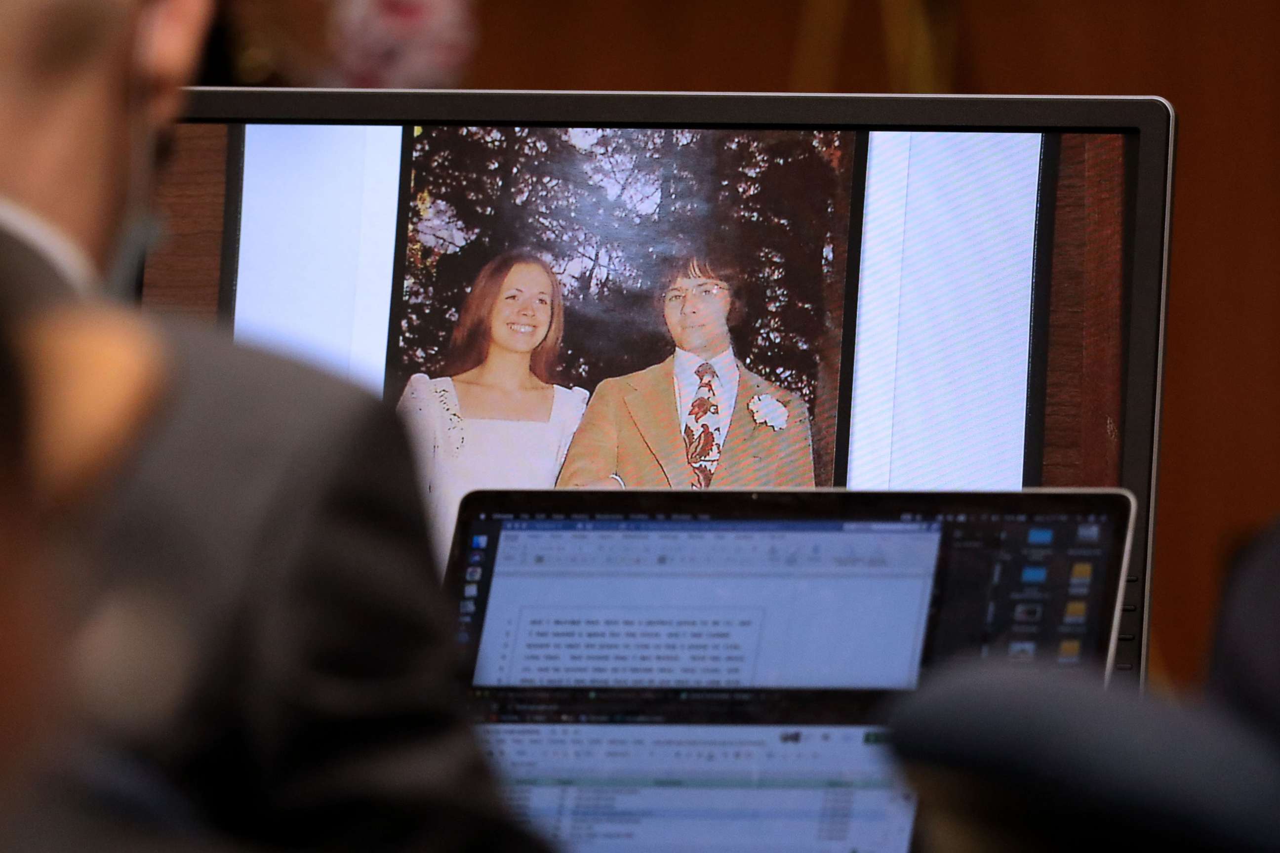 PHOTO: A photo of Robert Durst and former wife Kathie McCormack on their wedding day in 1973 is shown while Robert Durst takes the stand and testifies in his murder trial, at the Inglewood Courthouse, Aug. 9, 2021, in Inglewood, Calif.