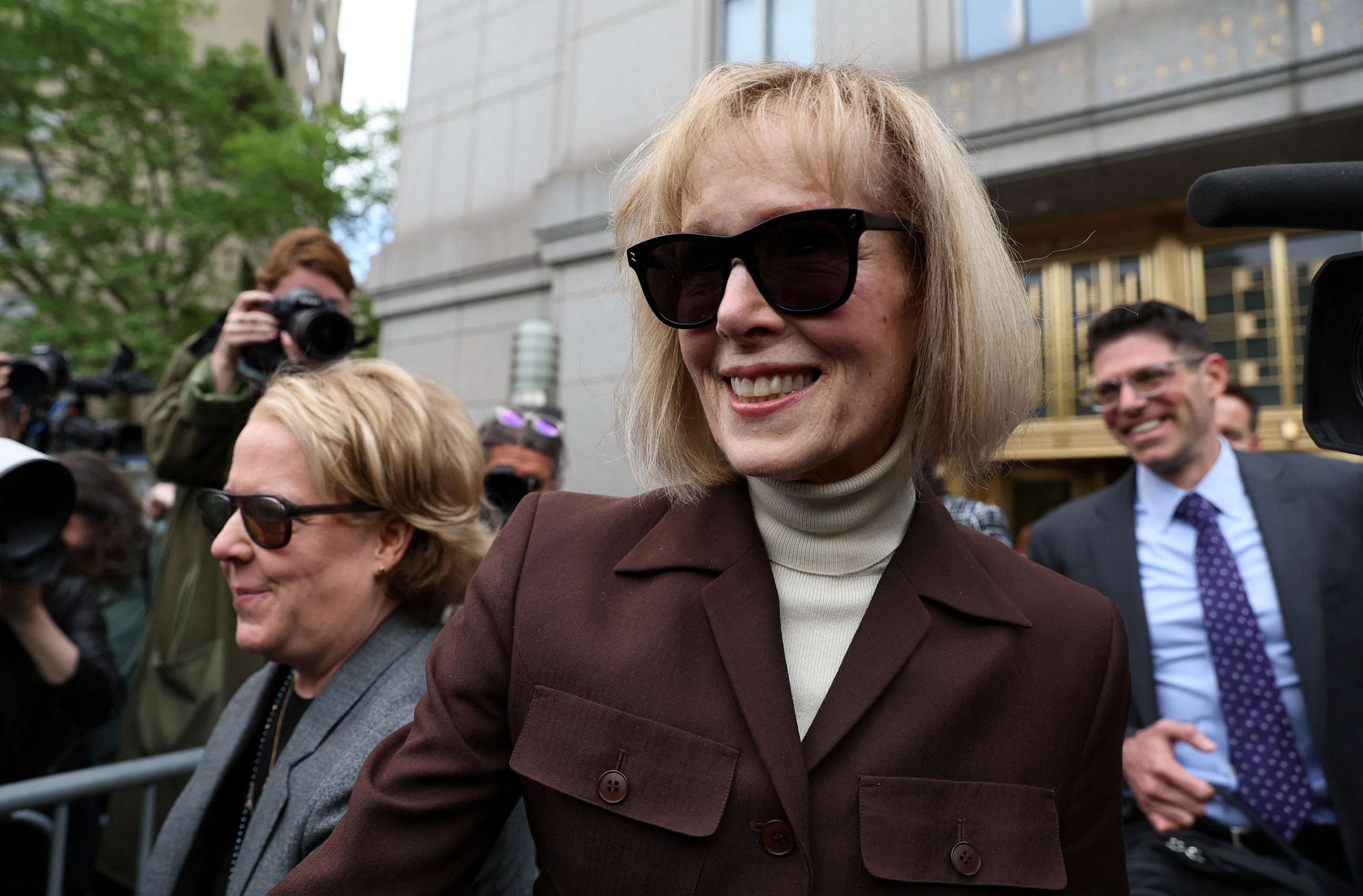 PHOTO: E. Jean Carroll exits the Manhattan Federal Court following the verdict in the civil rape accusation case against former President Donald Trump, in New York, on May 9, 2023.