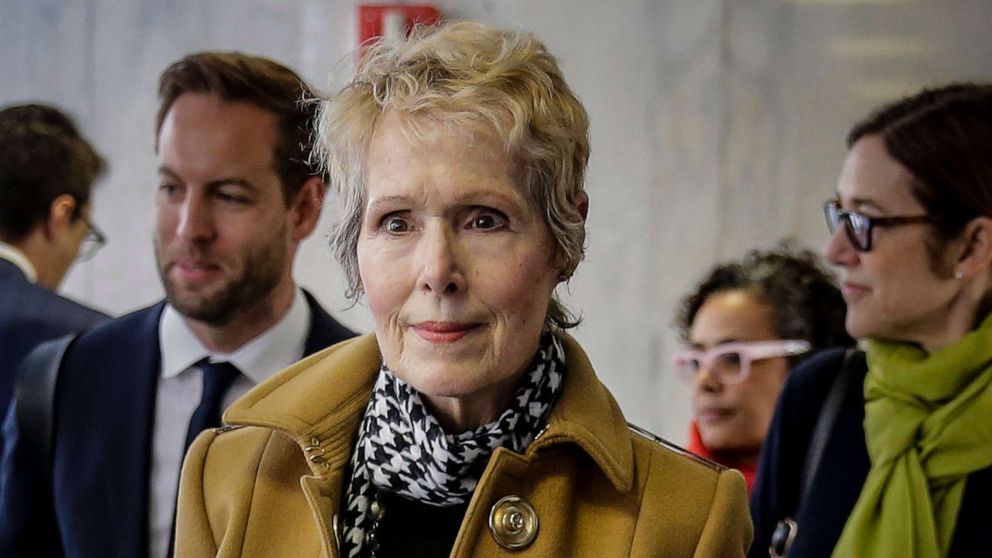 PHOTO: FILE - E. Jean Carroll, center, waits to enter a courtroom in New York for her defamation lawsuit against President Donald Trump, March 4, 2020.