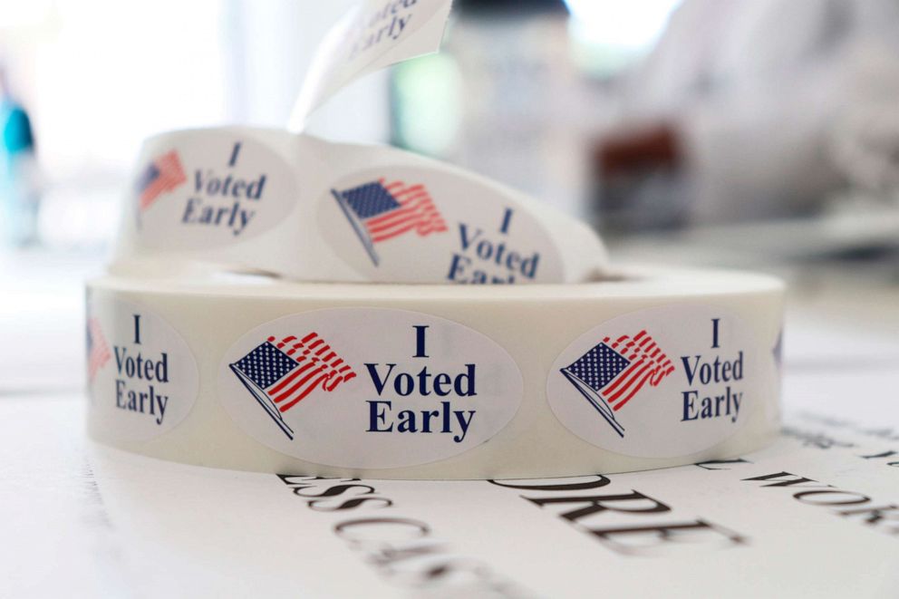 PHOTO: A roll of stickers awaiting distribution to early voters sits on a table at the check-in station at the Pulaski County Courthouse Annex in Little Rock, Ark., May, 21, 2018. 