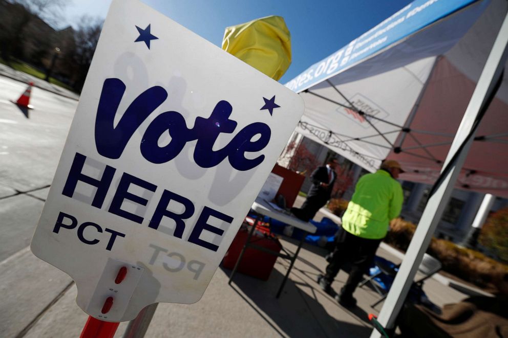 PHOTO: A sign directs voters to an Elections Division drop off location in Denver, Nov. 6,2018.