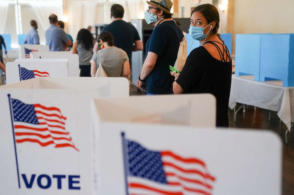 PHOTO:People wait in line to vote in Georgia's Primary Election in Atlanta, June 9, 2020.