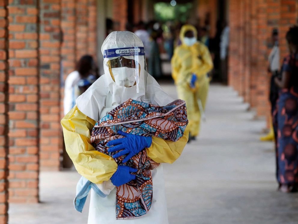 PHOTO: A health care worker carries a baby suspected of being infected with Ebola virus in a hospital in Oicha, North Kivu Province of Democratic Republic of Congo, Dec. 6, 2018.