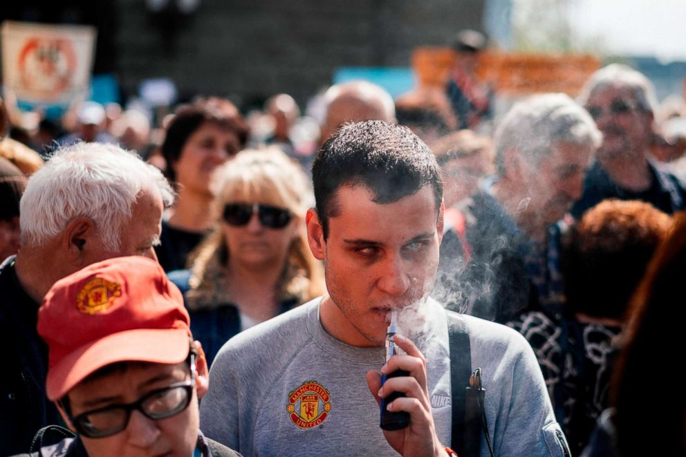 PHOTO: A man smokes an electronic cigarette during a protest in Sofia on April 11, 2018. 