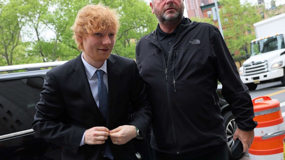 Ed Sheeran sings plays guitar on stand during copyright infringement