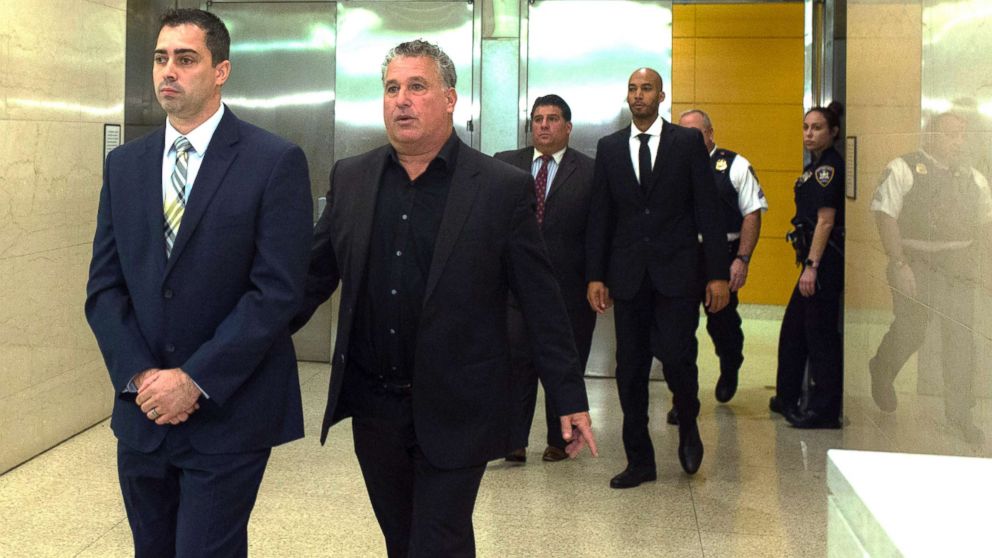 PHOTO: New York City police detectives Edward Martins, left, and Richard Hall, right, are escorted out of Kings County Supreme Court in Brooklyn, Oct. 30, 2017.