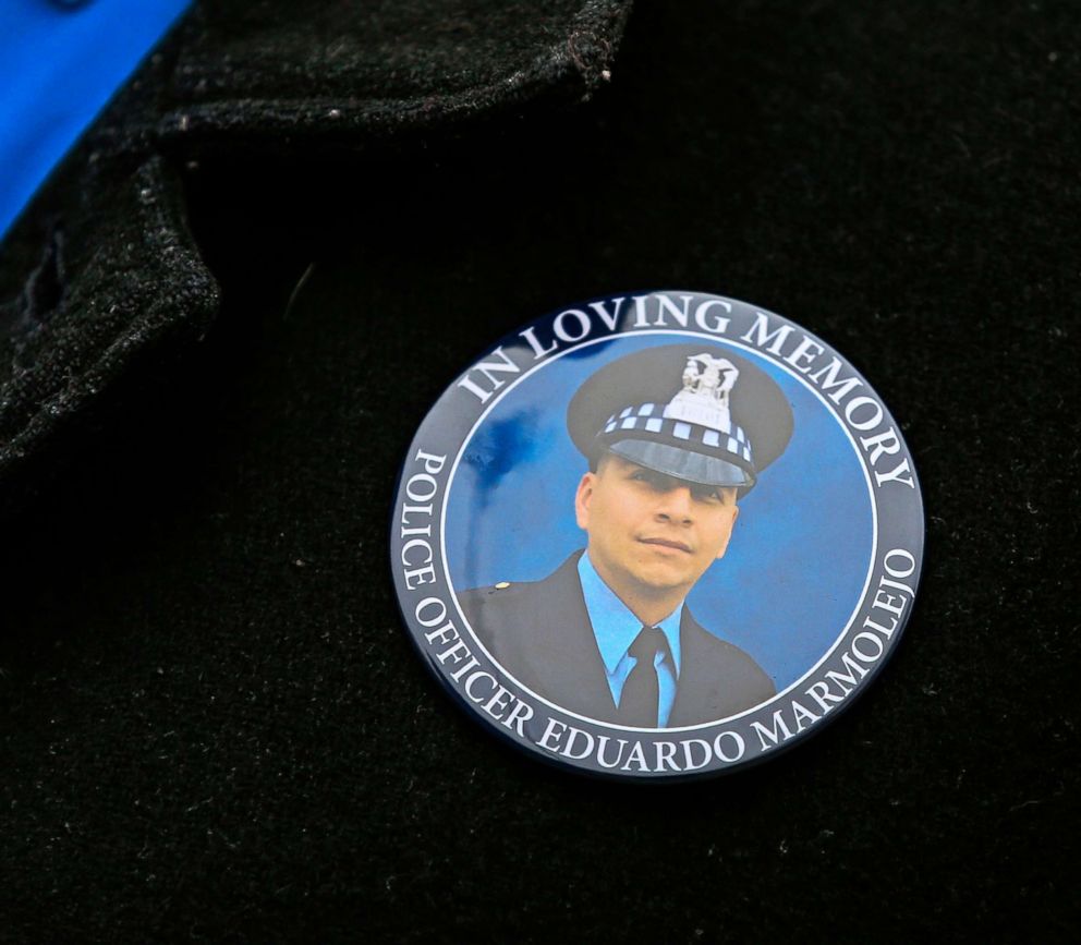 PHOTO: A man wears a memorial button commemorating the life of Chicago Police Officer Eduardo Marmolejo at his funeral service at St. Rita of Cascia Shrine Chapel in Chicago, Dec. 22, 2018.