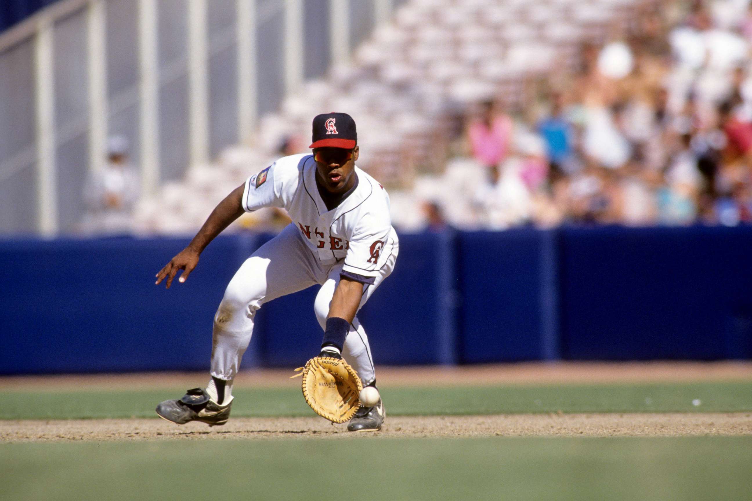 PHOTO: Eduardo Perez of the California Angels fields during the game against the Cleveland Indians at Anaheim Stadium, April 11, 1994, in Anaheim, Calif.