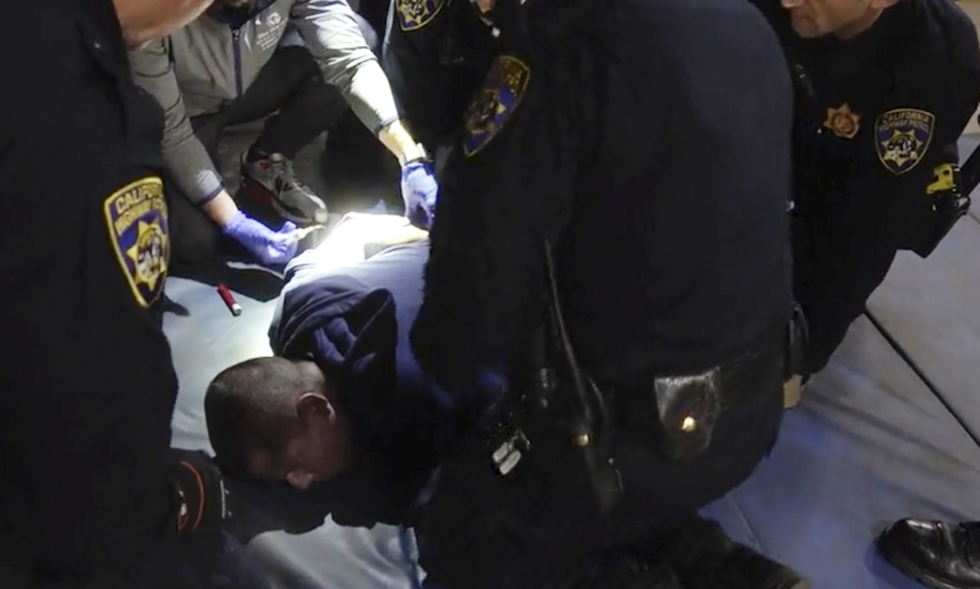 PHOTO: In this image taken from a nearly 18-minute video taken by a California Highway Patrol sergeant, Edward Bronstein, 38, is taken into custody by CHP officers on Mar. 31, 2020, following a traffic stop in Los Angeles.