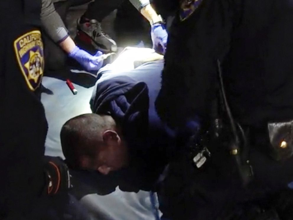 PHOTO: In this image taken from a nearly 18-minute video taken by a California Highway Patrol sergeant, Edward Bronstein, 38, is taken into custody by CHP officers on Mar. 31, 2020, following a traffic stop in Los Angeles.