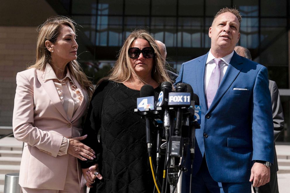PHOTO: Edward Bronstein's long-time girlfriend and mother of his children, Aundrea, who wished to be identified by her first name, is flanked by her attorneys, Eric Dubin, right, and Annee Della Donna at a news conference in Los Angeles, May 10, 2023.