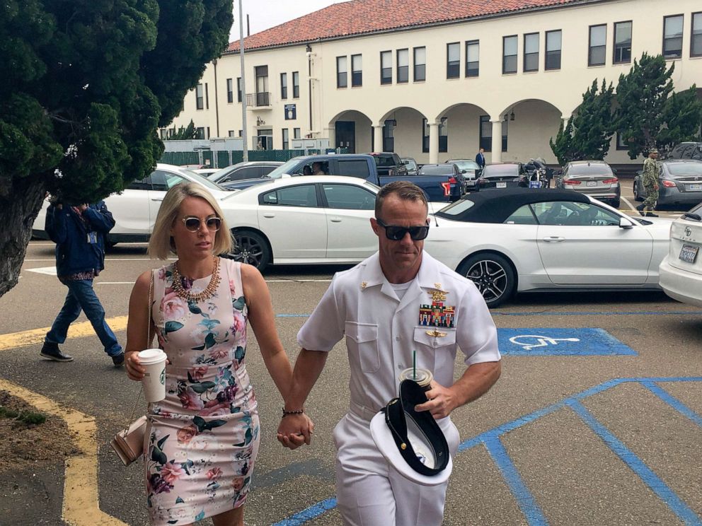 PHOTO: Navy Special Operations Chief Edward Gallagher walks with his wife, Andrea Gallagher, left, as they arrive on Naval Base San Diego, June 20, 2019.