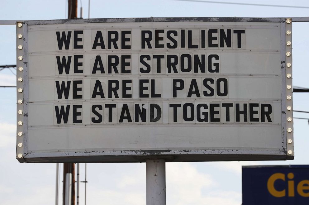 PHOTO: A sign is posted near the scene of a mass shooting at a Walmart which left at least 20 people dead, Aug. 4, 2019 in El Paso, Texas. 