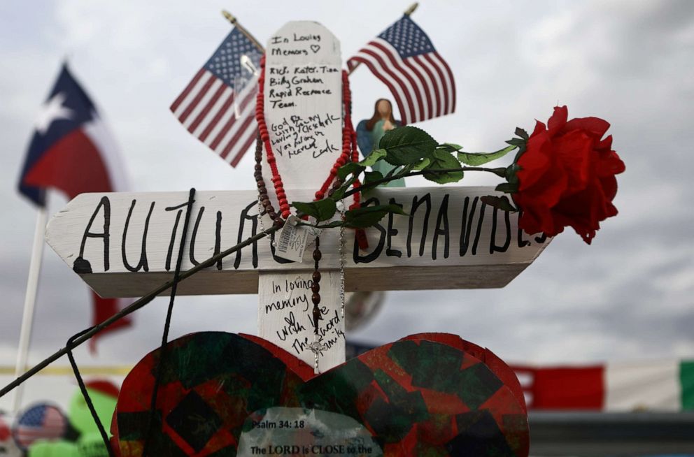 PHOTO: A cross honoring Arturo Benavides, 60, stands at a makeshift memorial for victims of a mass shooting outside Walmart in El Paso, Texas, Aug. 6, 2019.