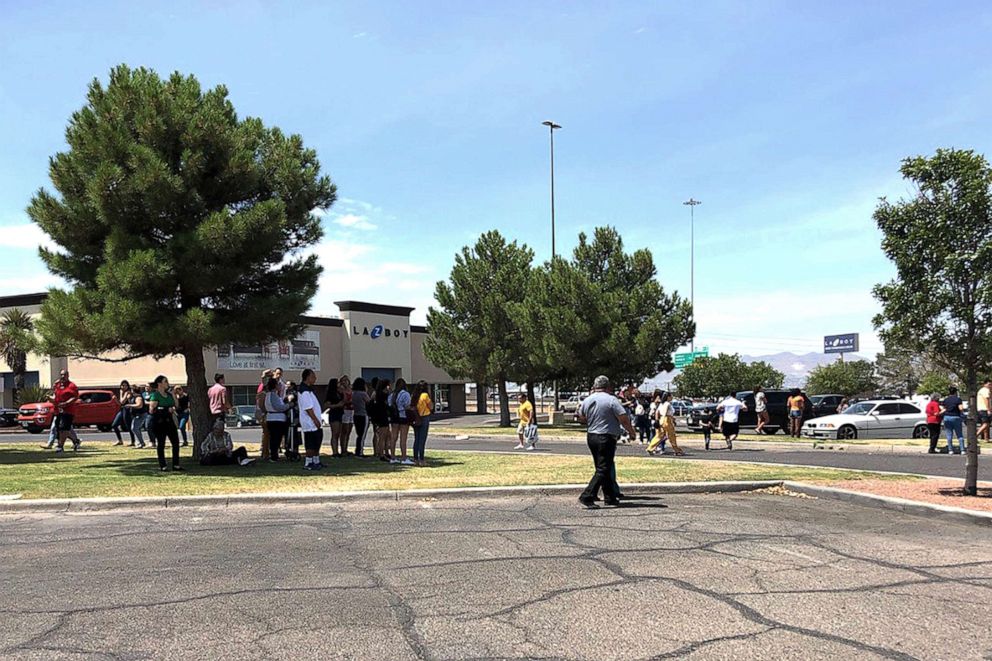 PHOTO: People stand outside the Cielo Vista Mall during an active shooter situation inside the Mall in El Paso, Texas, Aug. 03, 2019.