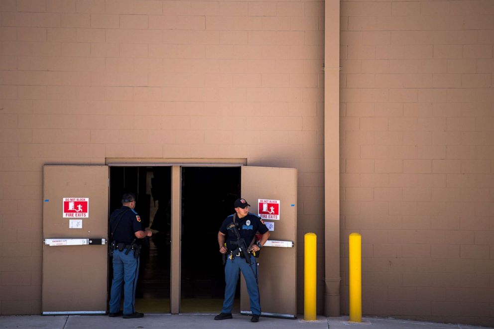 PHOTO: Law enforcement agencies cover the exits of a Wal-Mart where a shooting occurred near Cielo Vista Mall in El Paso, Texas, Aug. 3, 2019.