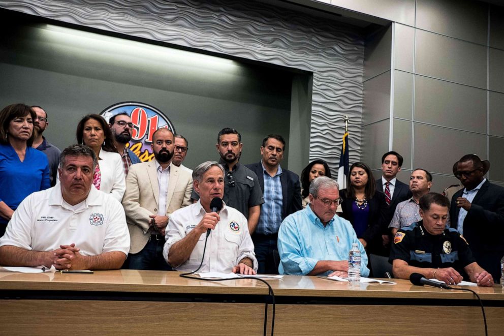 PHOTO: Texas Governor Greg Abbott, joined by El Paso city officials, speaks during a press briefing following a mass fatal shooting, at the El Paso Regional Communications Center in El Paso, Texas, Aug. 3, 2019.