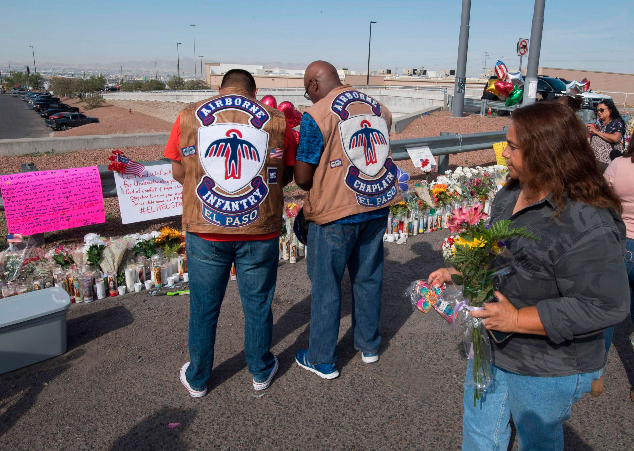 PHOTO: People pray at a makeshift memorial after the shooting that left at least 22 people dead at the Cielo Vista Mall WalMart in El Paso, Texas, Aug. 5, 2019.