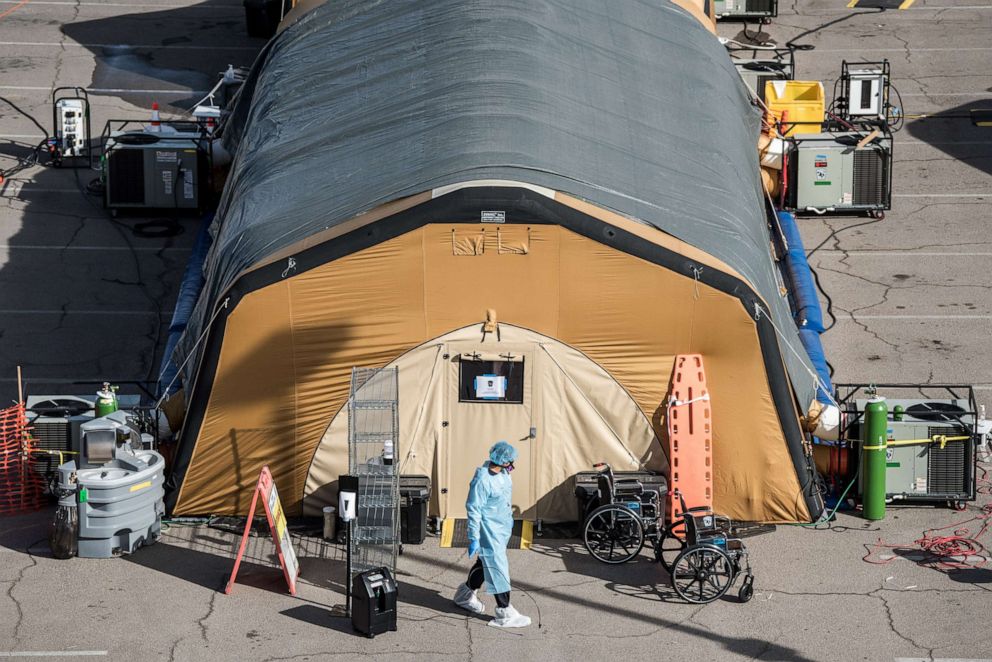 PHOTO: A nurse exits a tent for coronavirus patients setup at University Medical Center, Oct. 30, 2020, in El Paso, Texas.