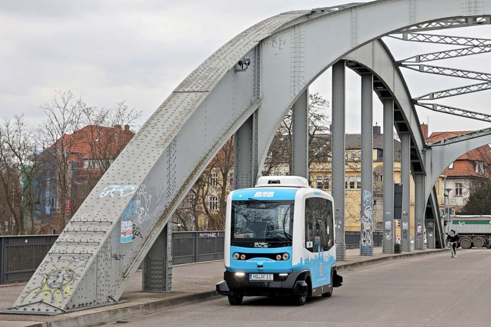 PHOTO: An EasyMile Elbi automated bus shuttle drives towards the Stadtpark in Madgeburg, Germany on Dec. 14, 2021.