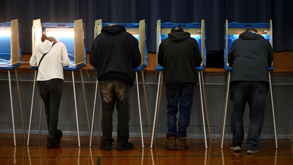 PHOTO: People vote in the 2024 U.S. presidential election on Election Day, at Doerfler Public School in Milwaukee, Wisconsin, Nov. 5, 2024. 