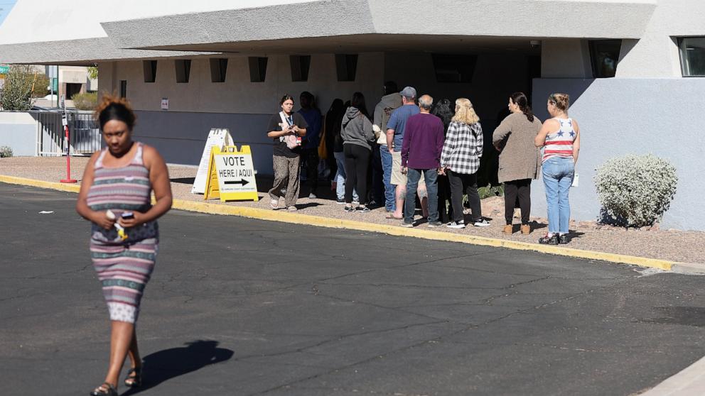 PHOTO: Voters lines up outside of the Mesa Convention Center polling place on Nov. 5, 2024, in Mesa, Arizona.