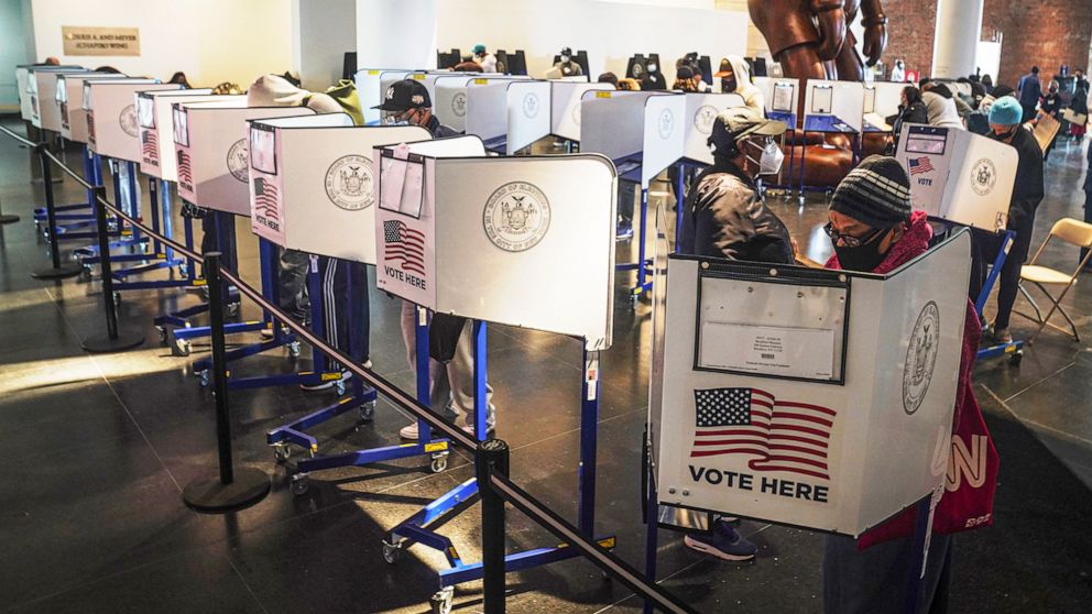 PHOTO: Voters cast their ballots at privacy booths during early voting at the Brooklyn Museum in New York, Oct. 27, 2020.