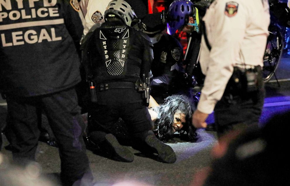 PHOTO: New York Police Department officers detain a protester during a Black Lives Matter demonstration in the Manhattan borough of New York, Nov. 5, 2020.