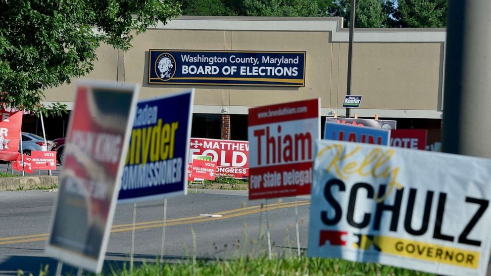 PHOTO: Campaign signs stand along the entrance to the polling place at the Washington County Board of Elections in Hagerstown Md., July 19, 2022.