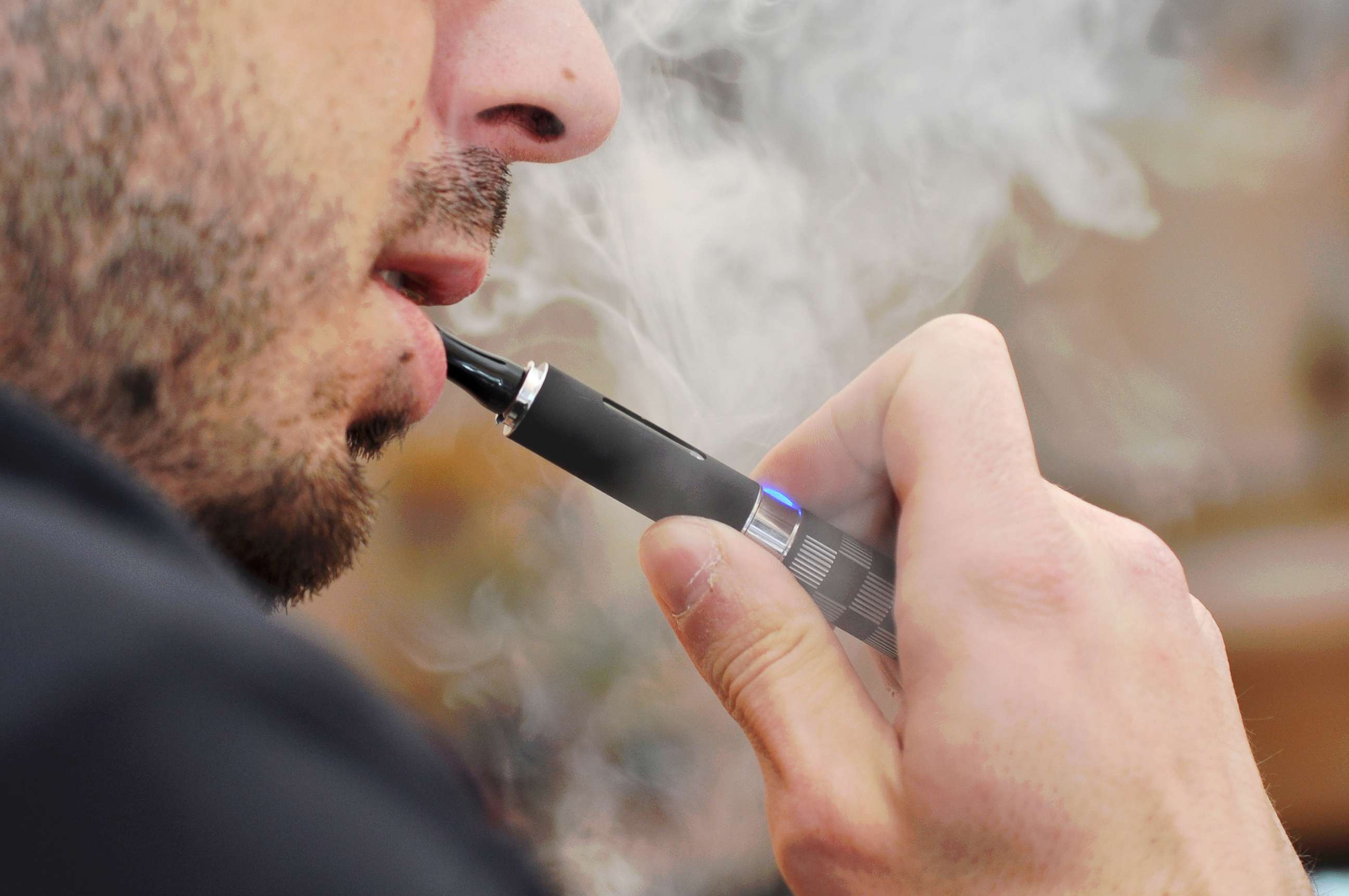PHOTO: A man uses a vape pen in an undated stock photo.