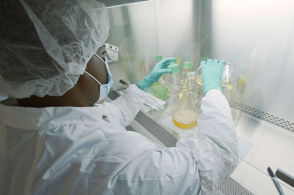 PHOTO: In this May 2020 file photo provided by Eli Lilly and Company, a researcher tests possible COVID-19 antibodies in a laboratory in Indianapolis, Indiana.