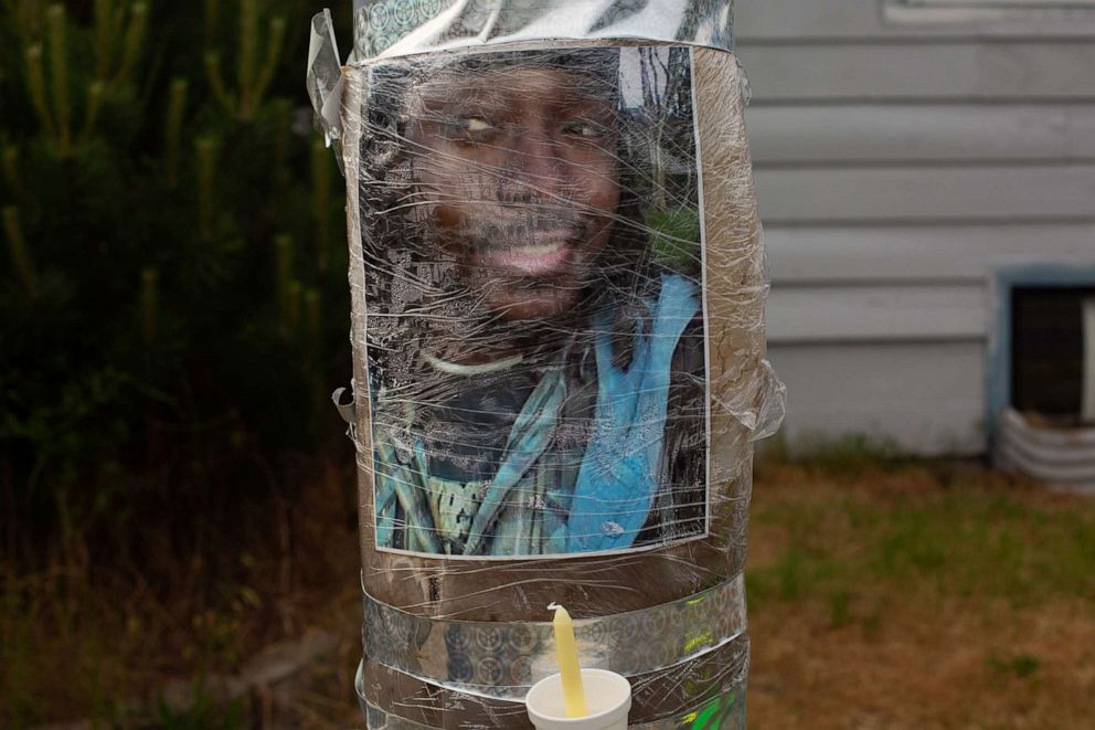 PHOTO: A photo of Manuel Ellis, a black man whose March death while in Tacoma Police custody was recently found to be a homicide, according to the Pierce County Medical Examiners Office, is seen near the site of his death, June 3, 2020, in Tacoma, Wash.