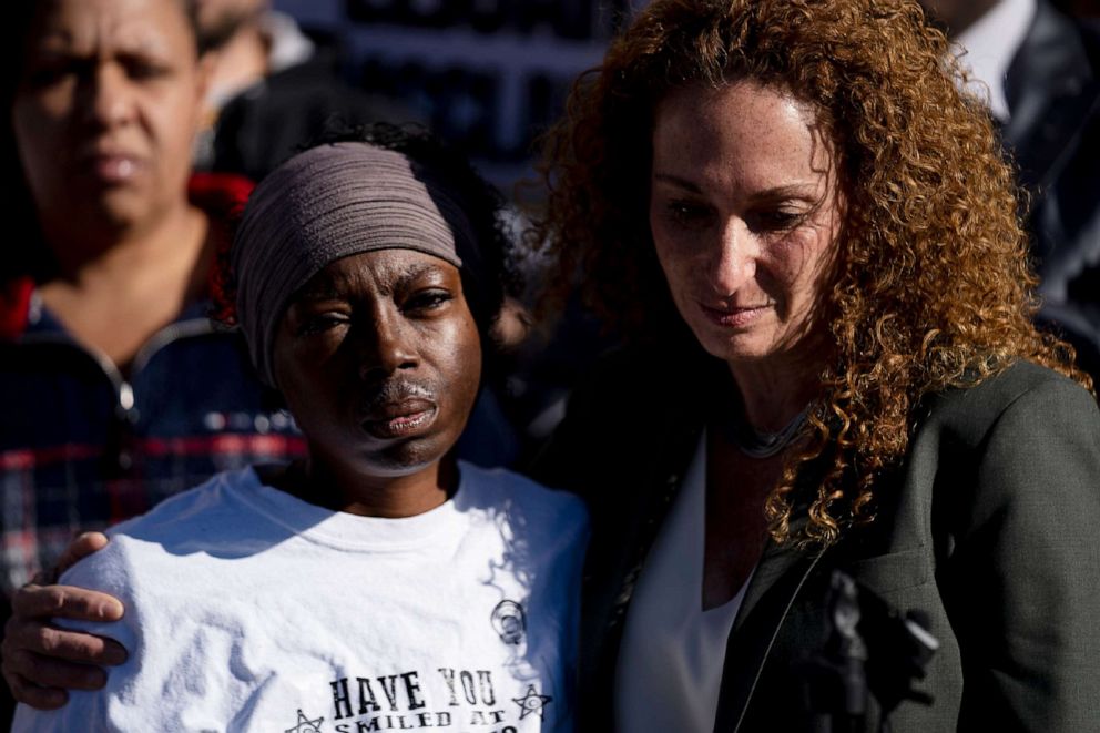 PHOTO: In this Nov. 23, 2019, file photo, attorney Mari Newman, right, hugs Sheneen McClain during a press conference after the police department released the body camera footage of McClain's son, Elijah, being stopped by the Aurora Police in August 2019.