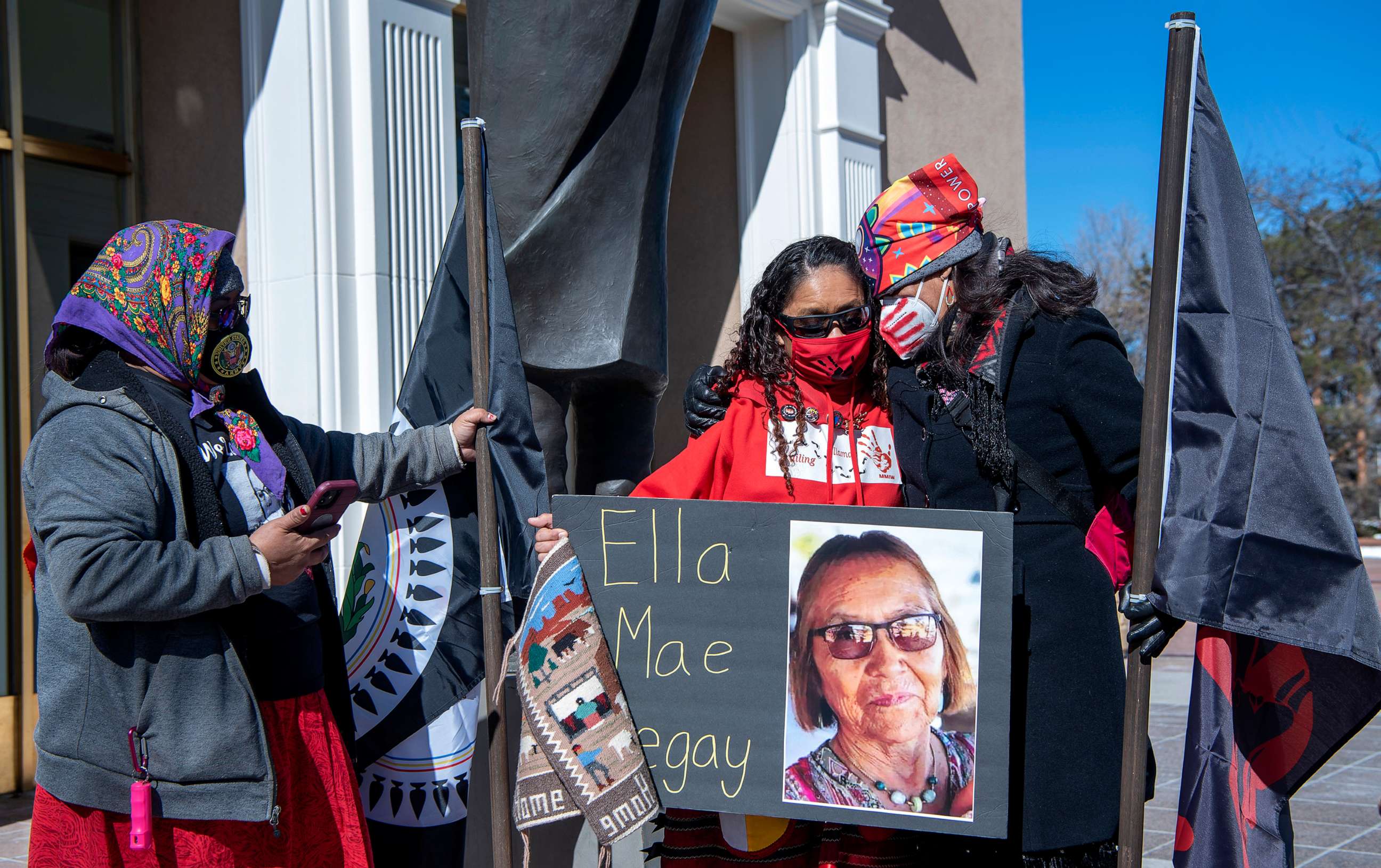 PHOTO: In this Feb. 4, 2022, file photo, Muzzy Denetso, from the Navajo Nation, Seraphine Warren, from Salt Lake City, and Sen. Shannon Pinto take part in a rally for Missing and Murdered Indigenous Women and Relatives, in Santa Fe, N.M.