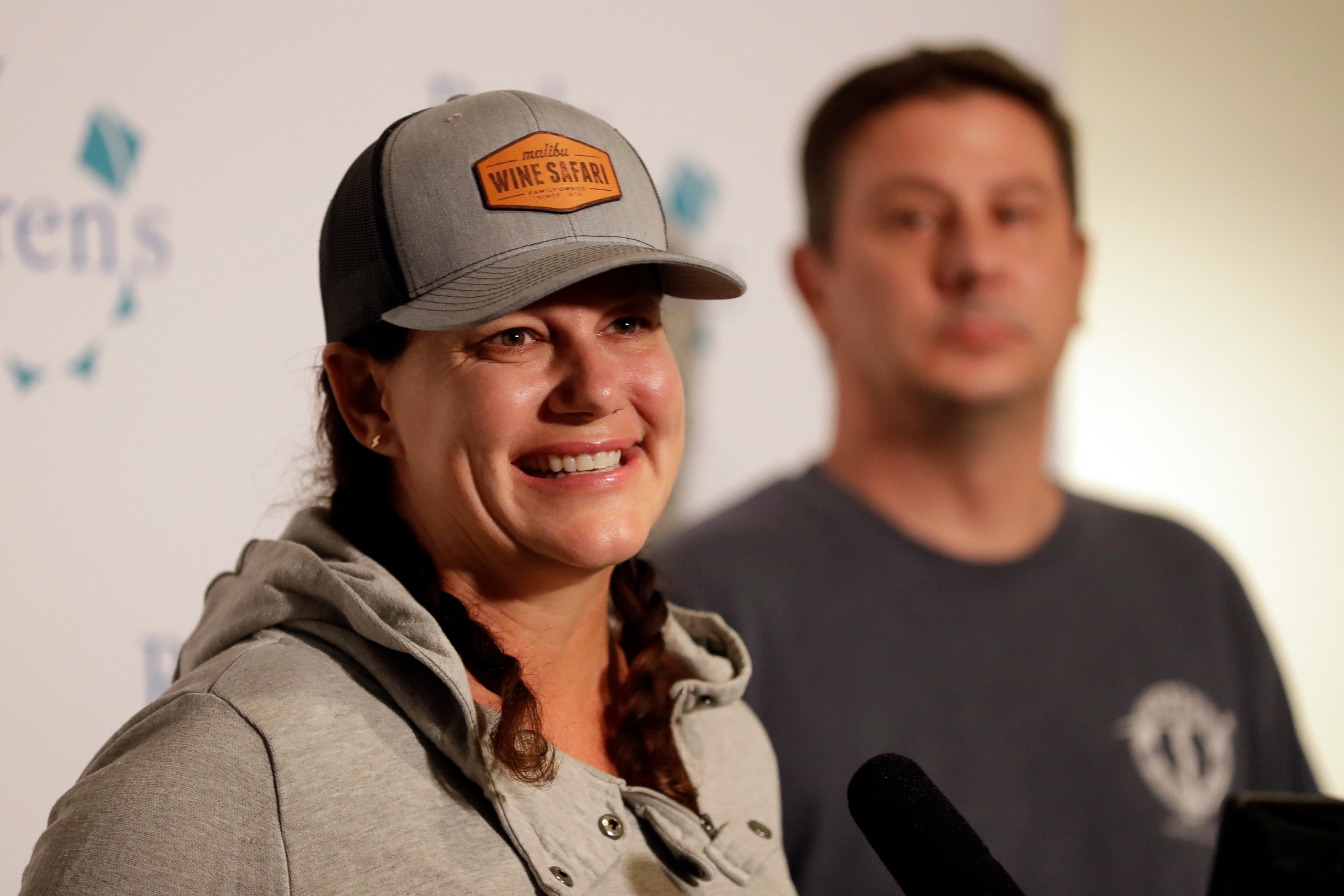 Ellie Hayes, the mother of Keane Webre-Hayes, reacts as she speaks about her son's recovery, alongside her husband, Ben, right, at a hospital Monday, Oct. 1, 2018, in San Diego. 