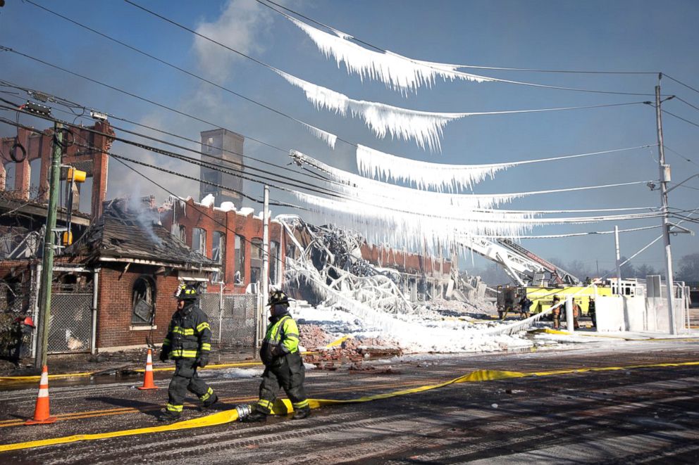 Firefighters struggle to battle blazes in brutally cold temperatures