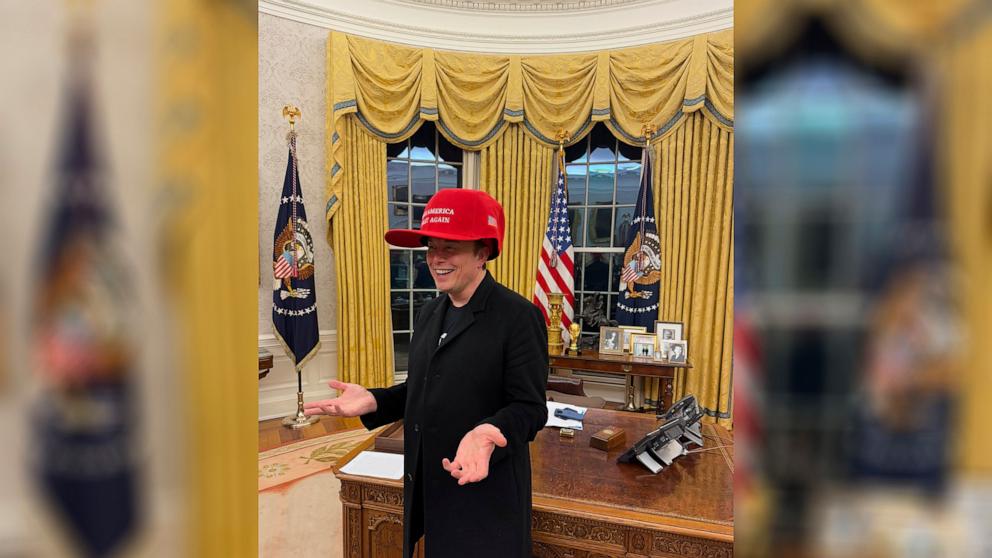 PHOTO: Elon Musk wears an oversized Maga hat in the Oval Office in Washington in an undated photo posted to his account in X.