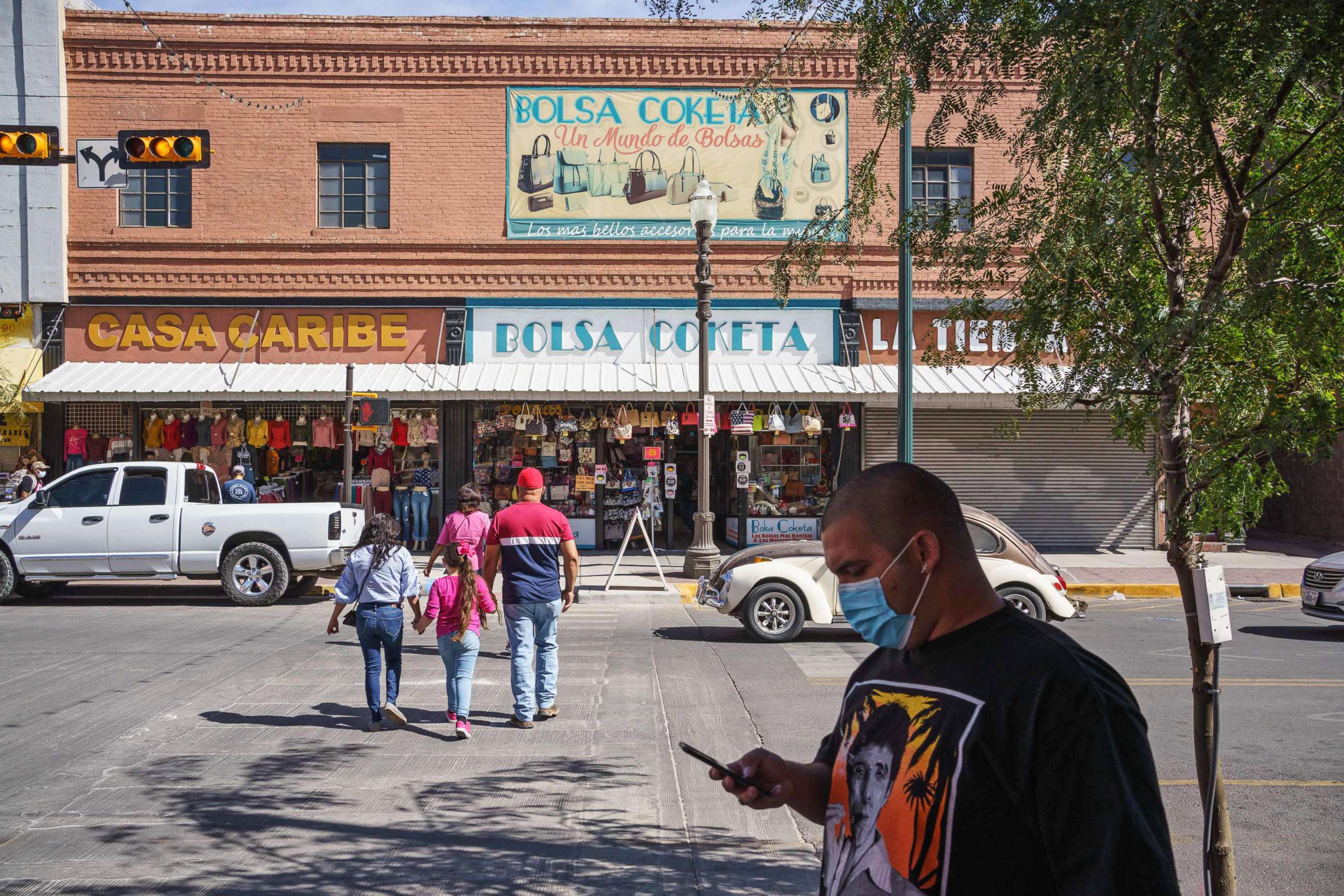 PHOTO: People wearing masks amid the Covid-19 pandemic are pictured in downtown El Paso, Texas, Oct. 24, 2020.