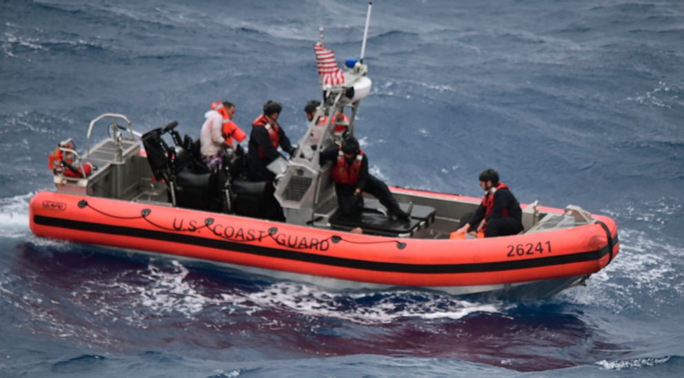PHOTO: The Coast Guard Cutter Thetis crewmembers deploy the cutter's small boat to rescue people in the water approximately 32 miles southeast of Key West, Fla., July  6, 2021.