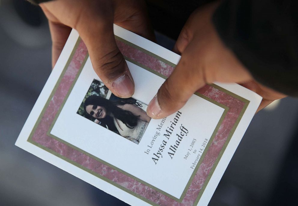 PHOTO: A person holds a program from the funeral of Alyssa Alhadeff at the Garden of Aaron at Star of David Memorial Gardens, Feb. 16, 2018, in Parkland, Fla. 